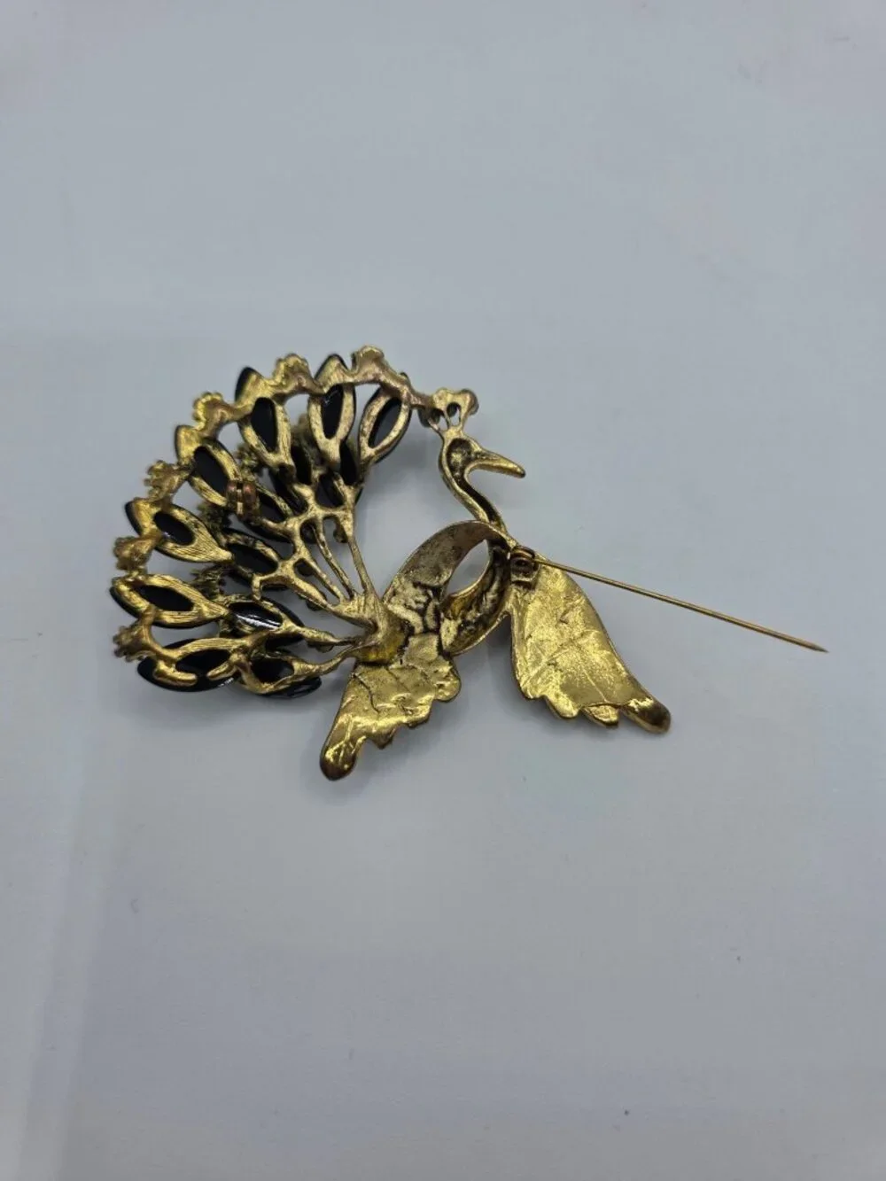 Gold-Tone Peacock Brooch With Rhinestone Wings & Black Gemstone Tail Feathers